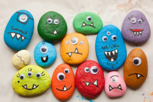 Colored rocks showing different colors, faces, types of rocks.