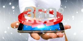 Man holding 360 degree 3D render icon over mobile phone