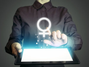 the symbol for woman above a laptop