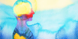a beautiful watercolor silhouette of a person with the brain and heart in yellow