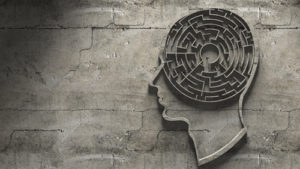 A brain with a labyrinth illustrates the need for mental health support on campus.