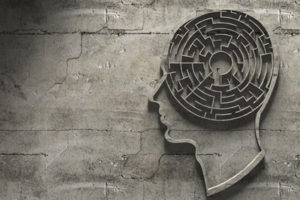 A brain with a labyrinth illustrates the need for mental health support on campus.