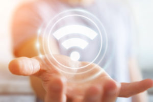 A wi-fi symbol illustrates the idea of how campus IT leaders need to know about wi-fi 6.
