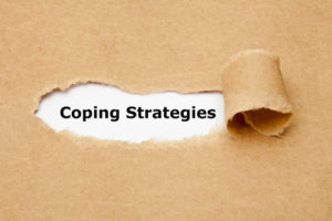 This torn paper saying coping strategies illustrates how students can learn to manage stress.
