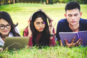 A bored and distracted student shows why it's important to have strategies for battling student distraction.