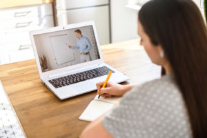 A student studies online with remote learning supported by a cloud-based student SIS.